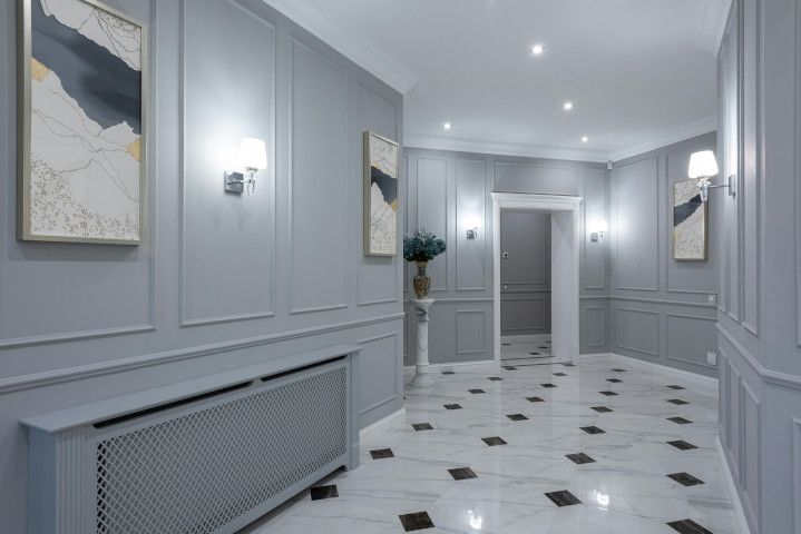 Luxury hallway with marble tiles expertly laid by Swansea tilers Daffodil Decor.